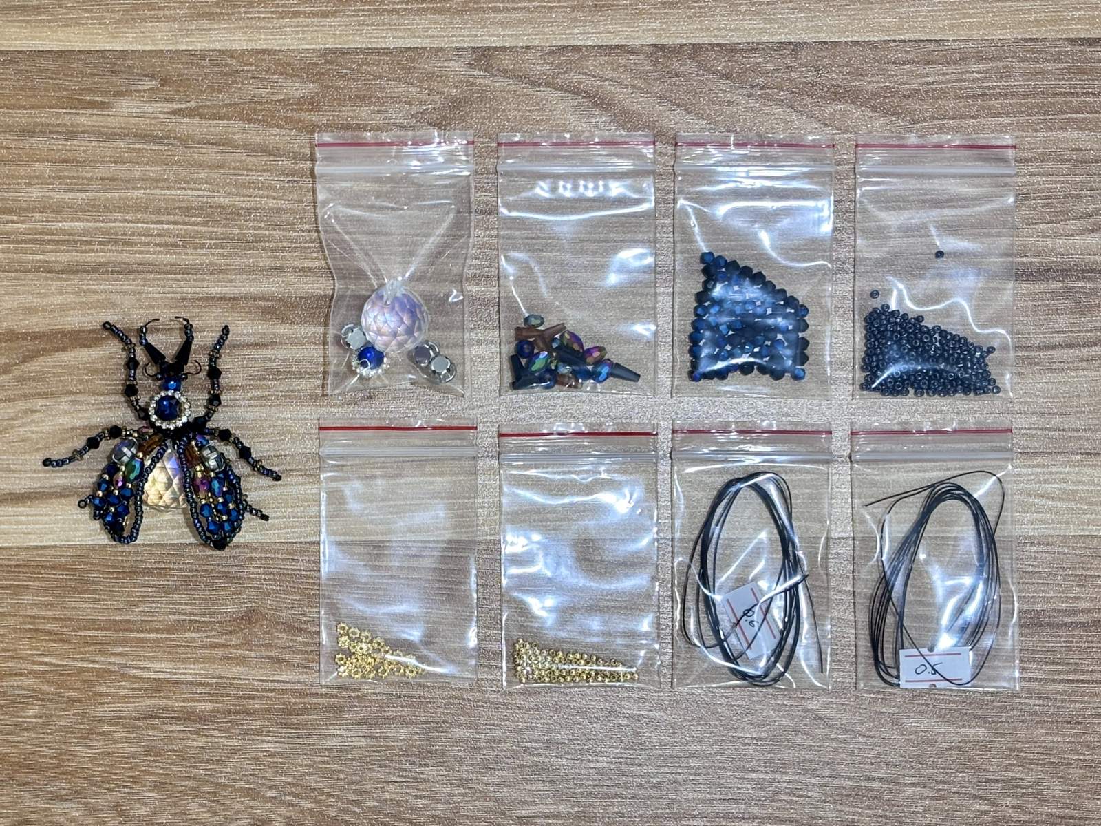 Stag Beetle Suncatcher DIY Kit - materials laid out
