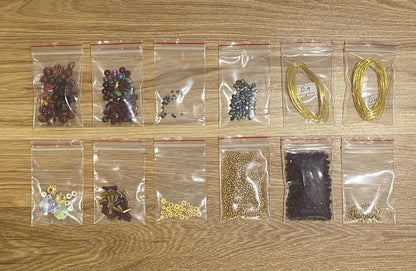 Dragon Suncatcher DIY Kit - materials laid out (Red)