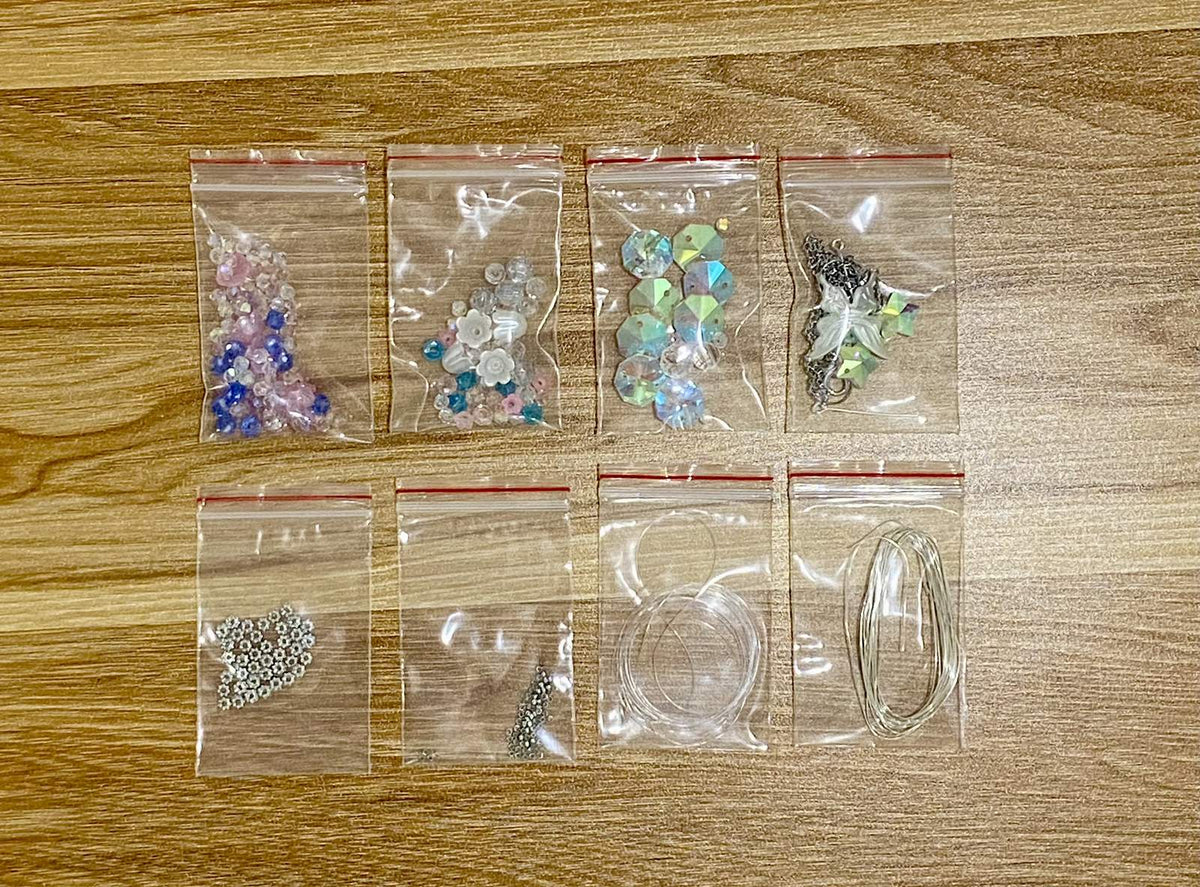 Jellyfish Suncatcher DIY Kit - materials laid out (Blue)