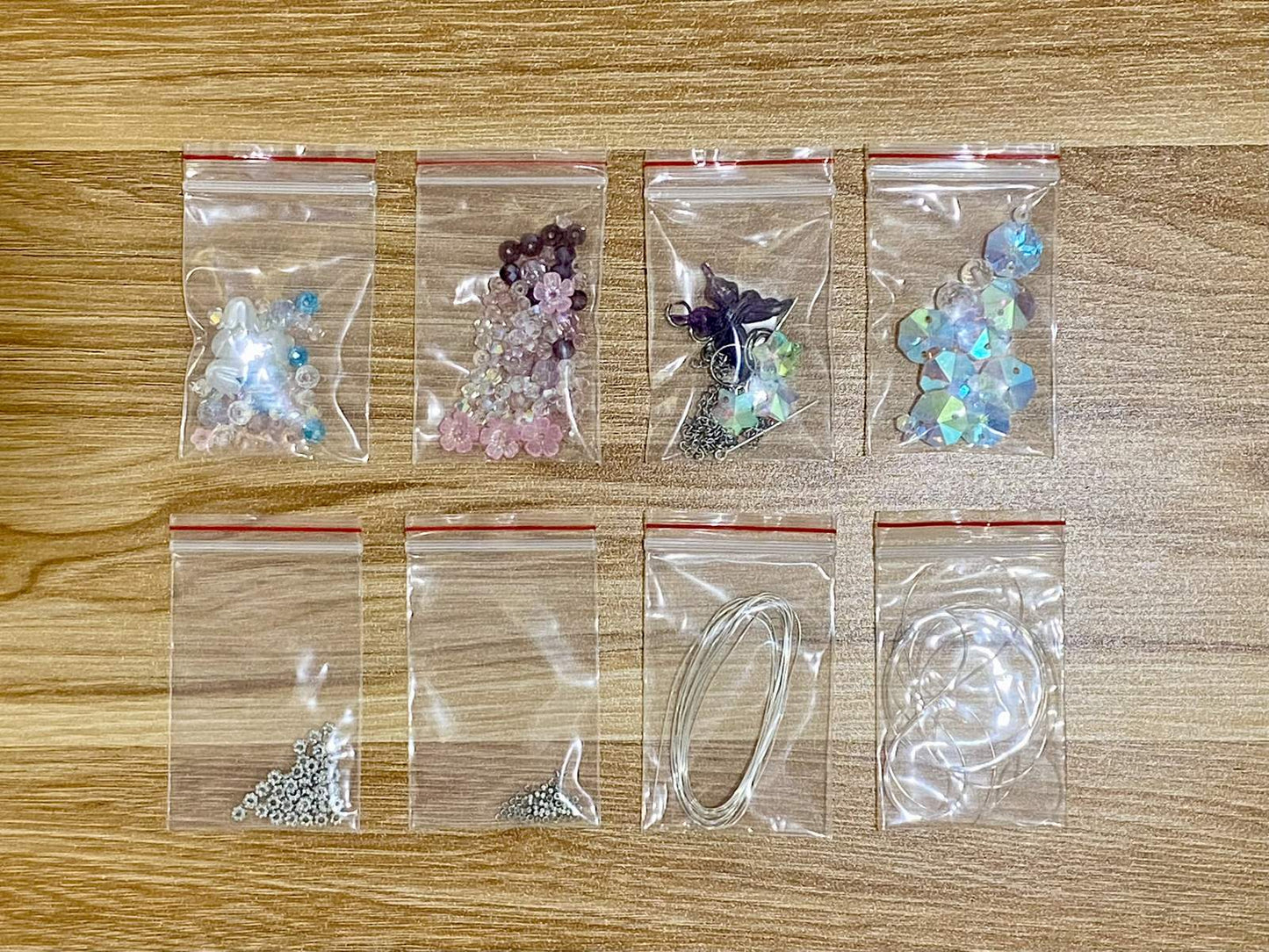 Jellyfish Suncatcher DIY Kit - materials laid out (Purple)