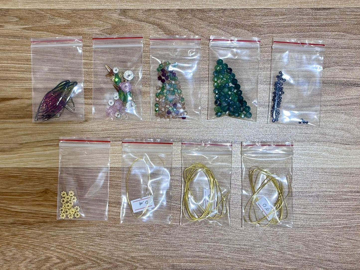 Mantis Suncatcher DIY Kit - materials laid out