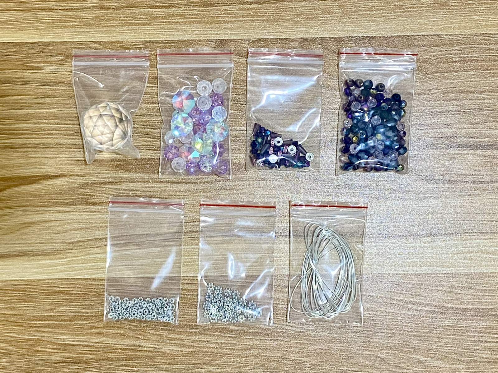 Octopus Suncatcher DIY Kit - materials laid out (Purple)