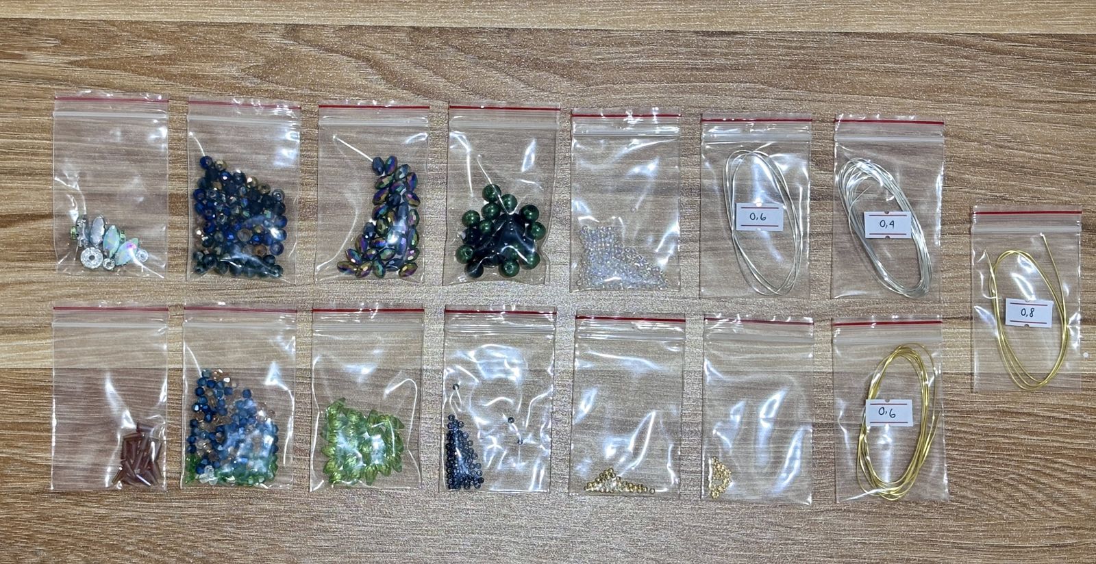 Peacock Suncatcher DIY Kit - materials laid out