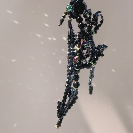 Black Dragon suncatcher in motion