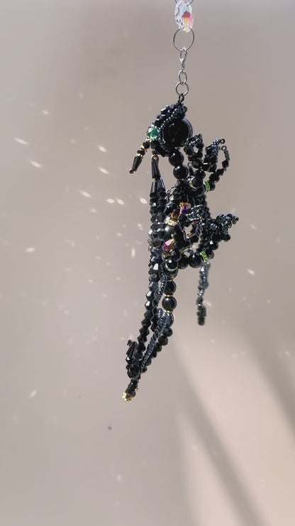Black Dragon suncatcher in motion