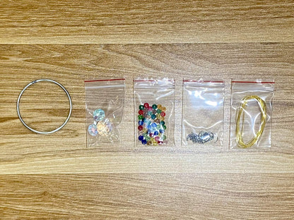 Rainbow Suncatcher DIY Kit - materials laid out (Rainbow)