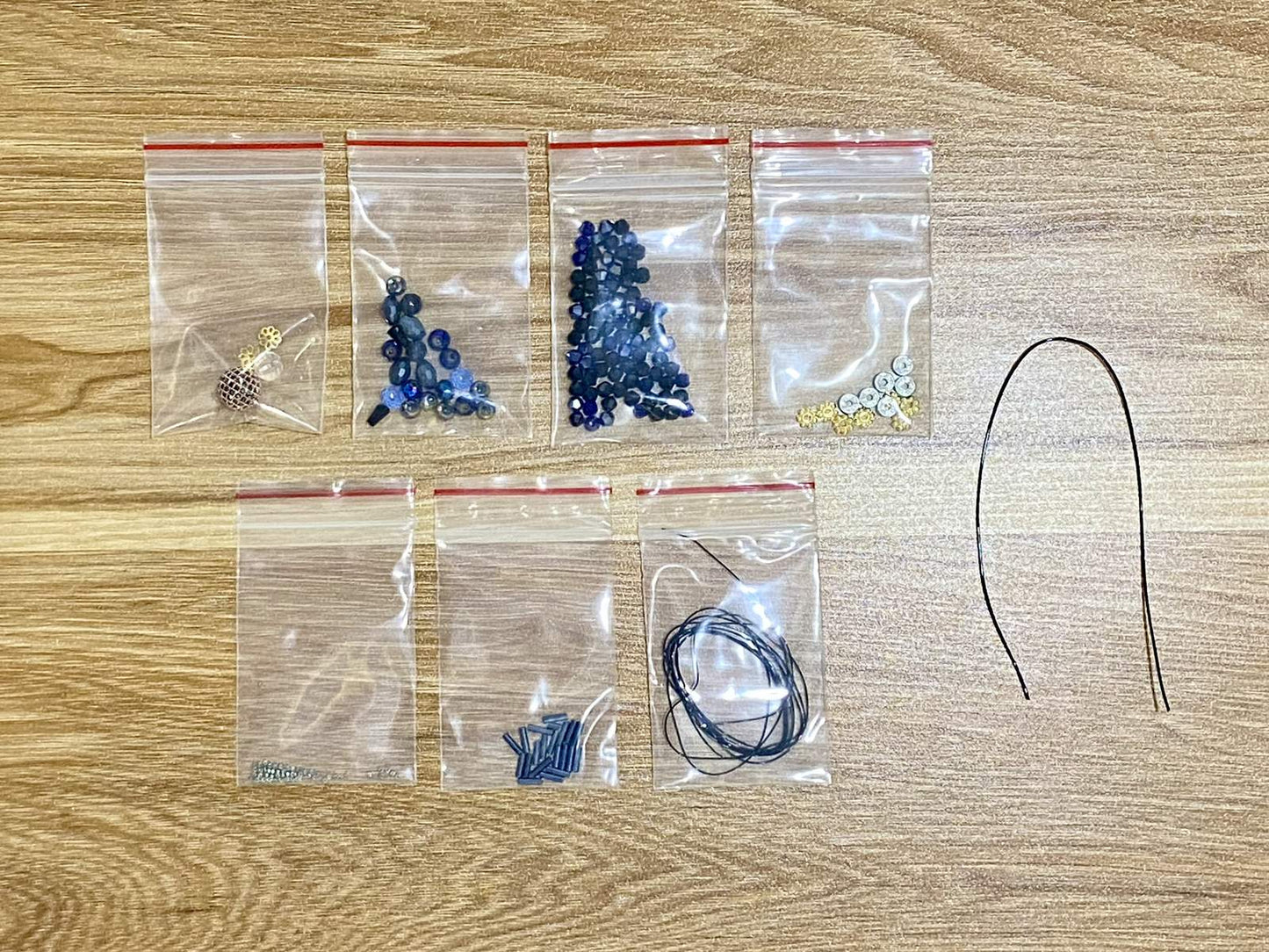 Scorpion Suncatcher DIY Kit - materials laid out (Blue)