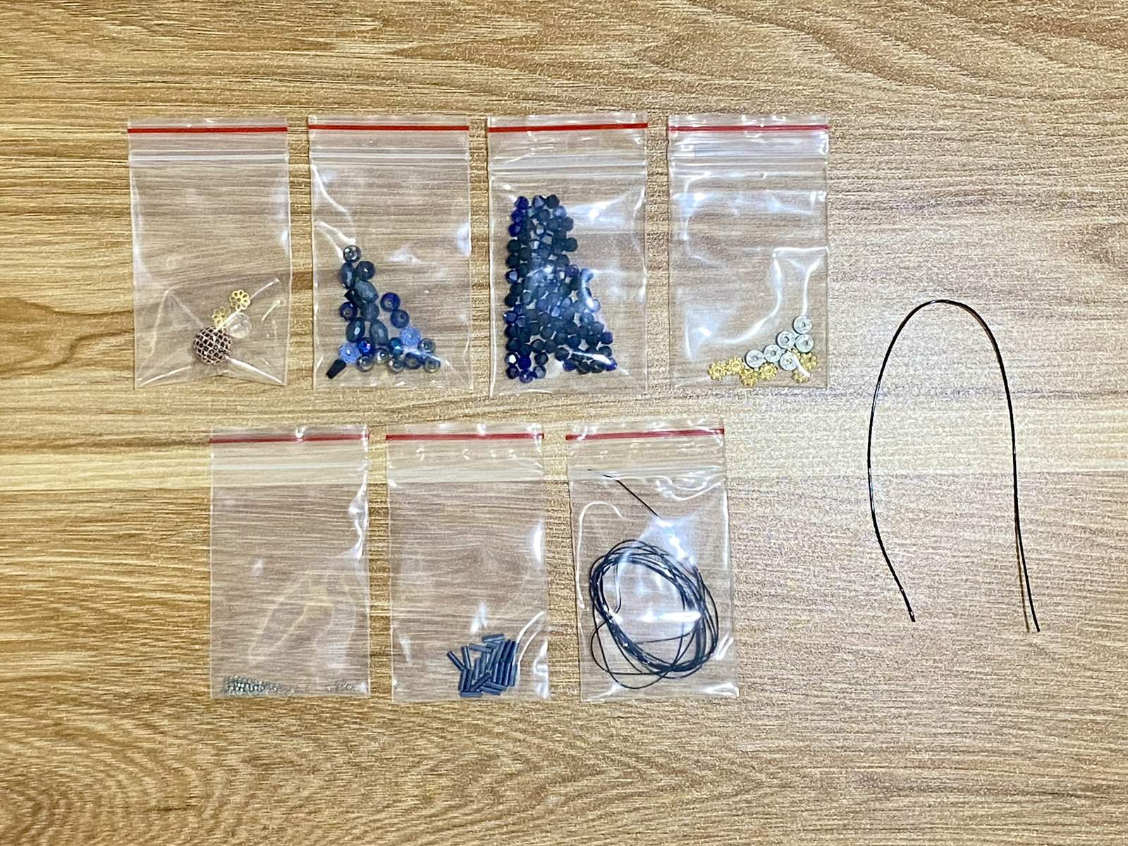 Scorpion Suncatcher DIY Kit - materials laid out (Blue)