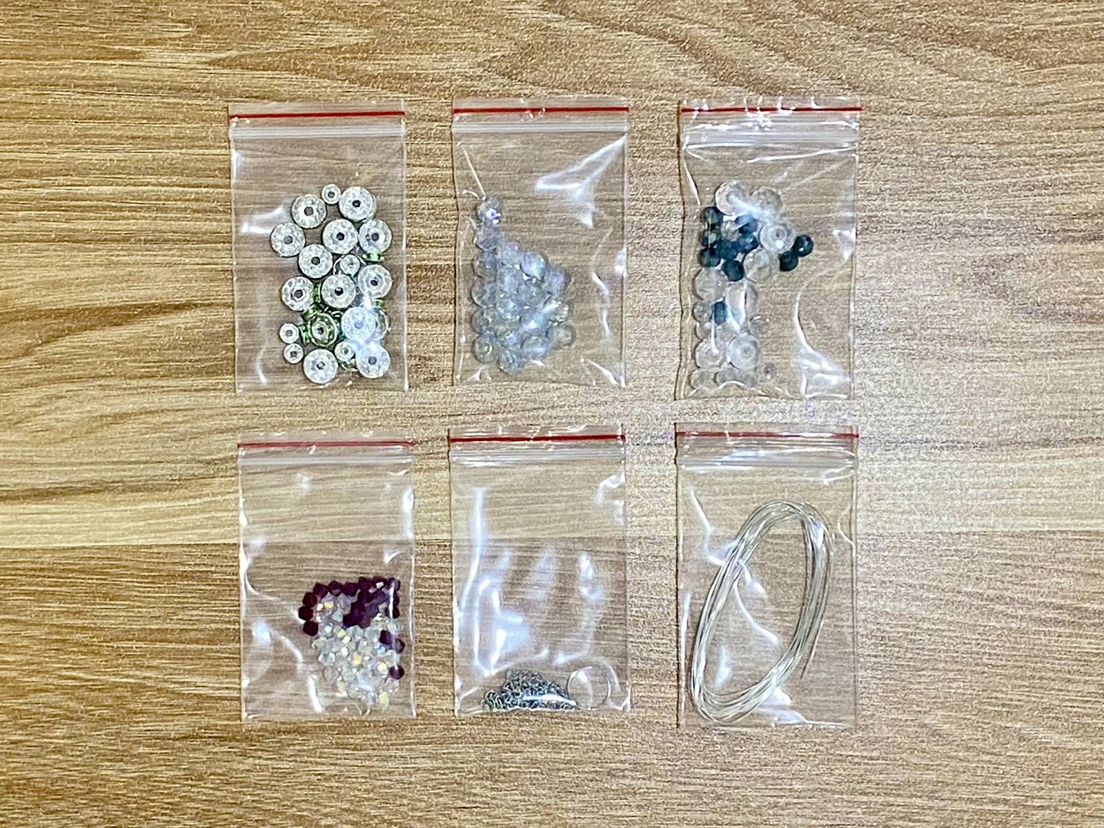 Snowflake Suncatcher DIY Kit - materials laid out (style 2)