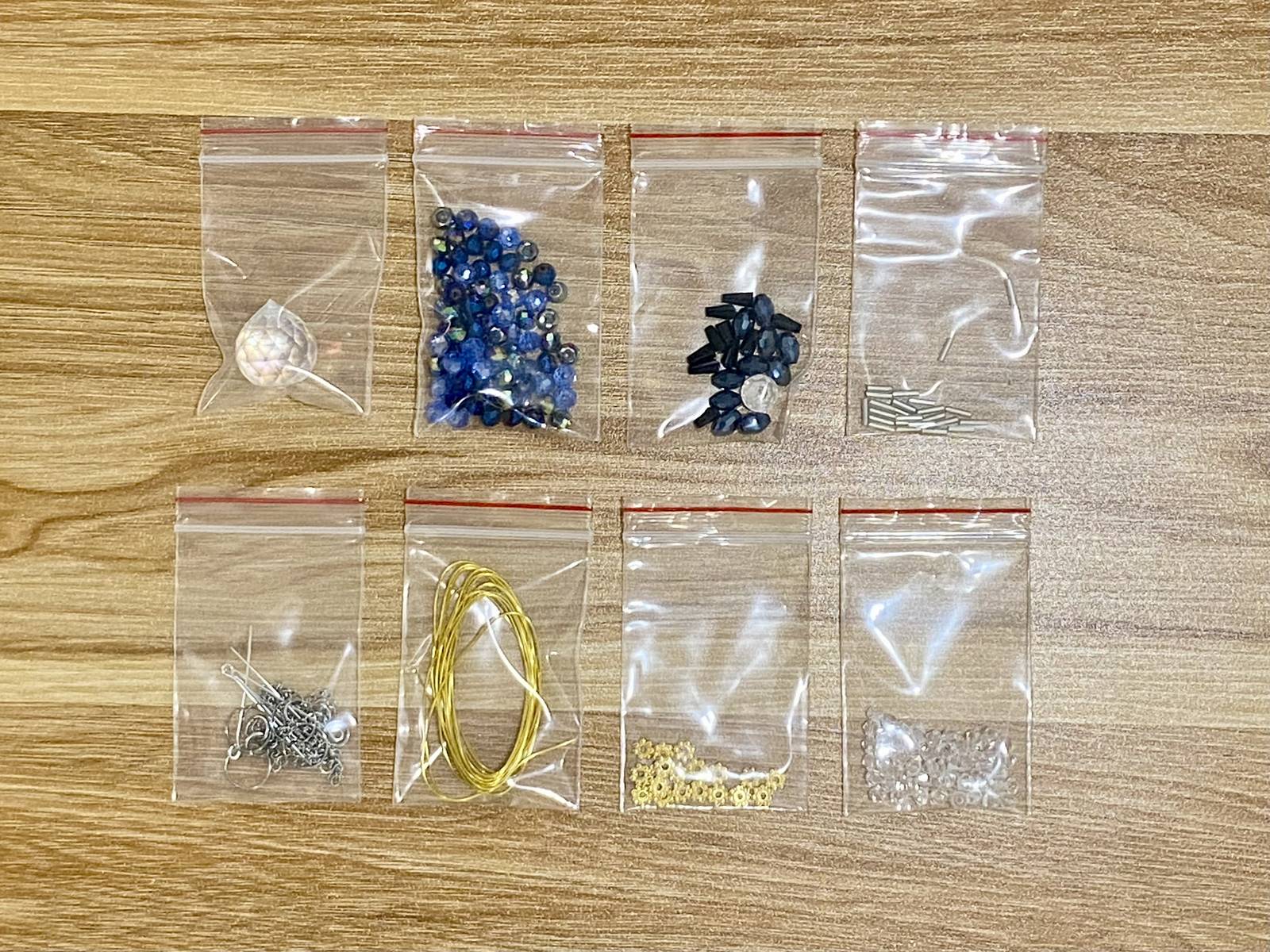 Spider Suncatcher DIY Kit - materials laid out (Blue)