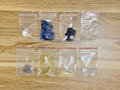 Spider Suncatcher DIY Kit - materials laid out (Blue)